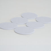 MIcroppose Adhesive Tub Filters on white background