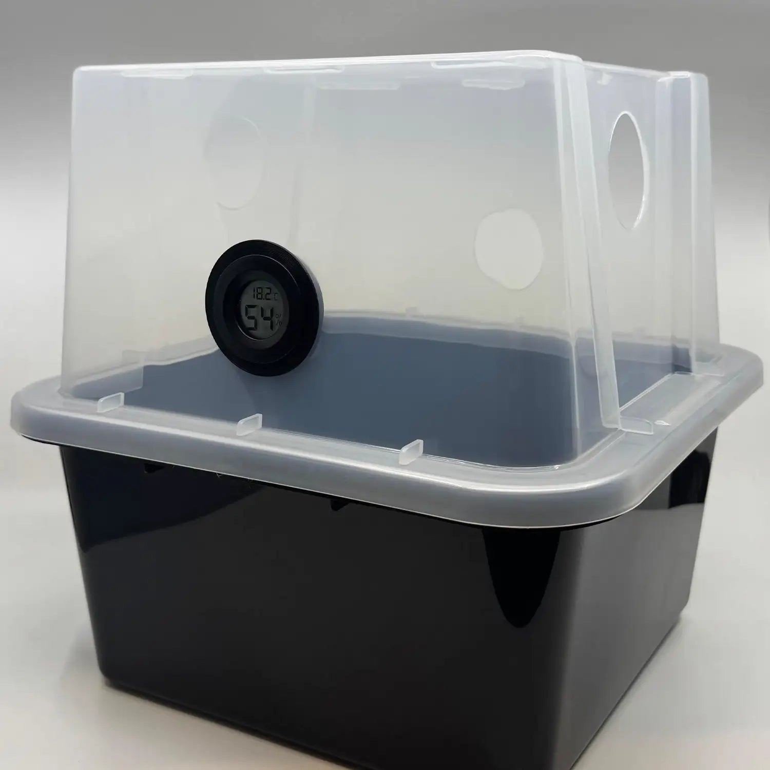 A Microppose monotub with the official thermometer / hygrometer installed