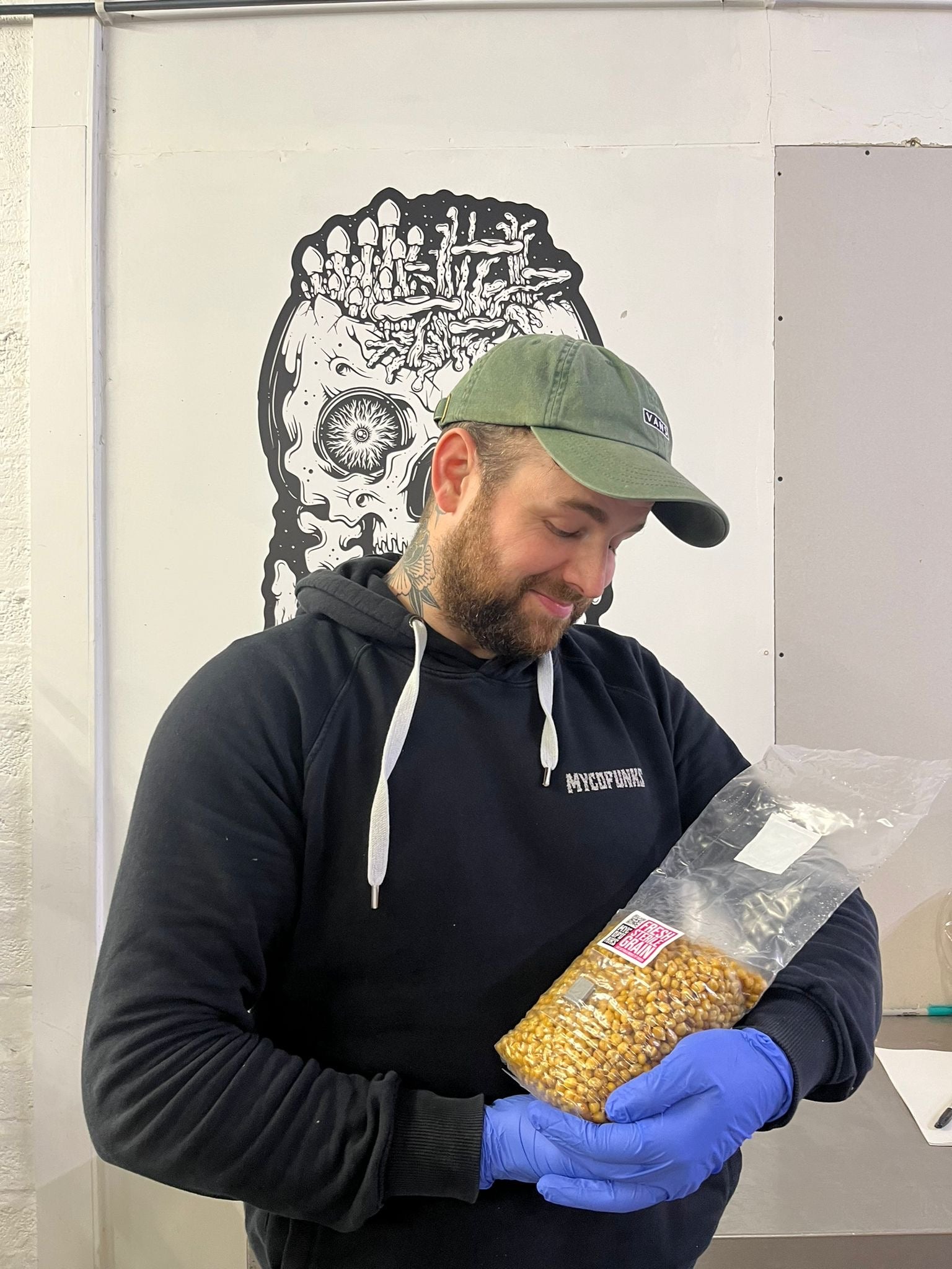 Sam from MycoPunks cradling the popcorn like it was a tiny baby